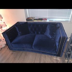 Two piece dark blue couches one large one medium